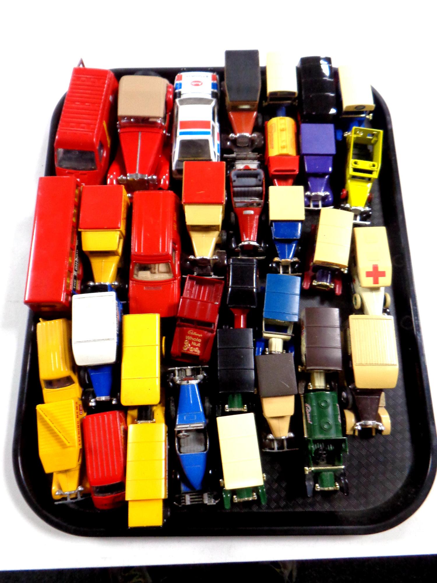 A tray containing die cast vehicles to include Matchbox, Corgi,