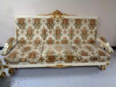 An Italian Silik Baroque style three seater settee,