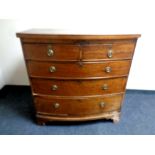 A 19th century mahogany bow fronted two over three drawer chest