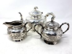 A Chinese silver plated three-piece tea service,