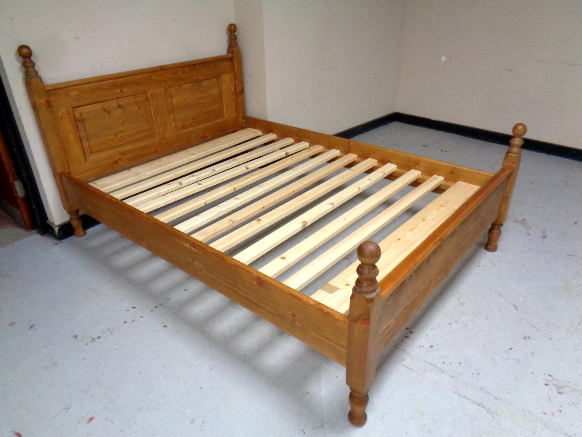 A 4'6 pine bed frame