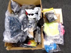 A box containing a quantity of new clothing, boots,