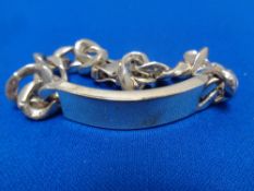 A heavy silver identity bracelet