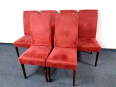 A set of six Mobitec high backed dining chairs upholstered in a red fabric