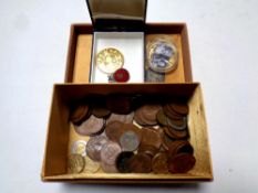 A box containing a small quantity of pre decimal coinage and Queen Elizabeth II commemorative gilt