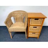 A pine and wicker three drawer chest together with a wicker armchair