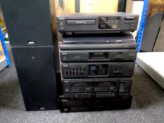 A Sanyo hifi system with speakers together with a Pioneer stereo graphic equaliser,