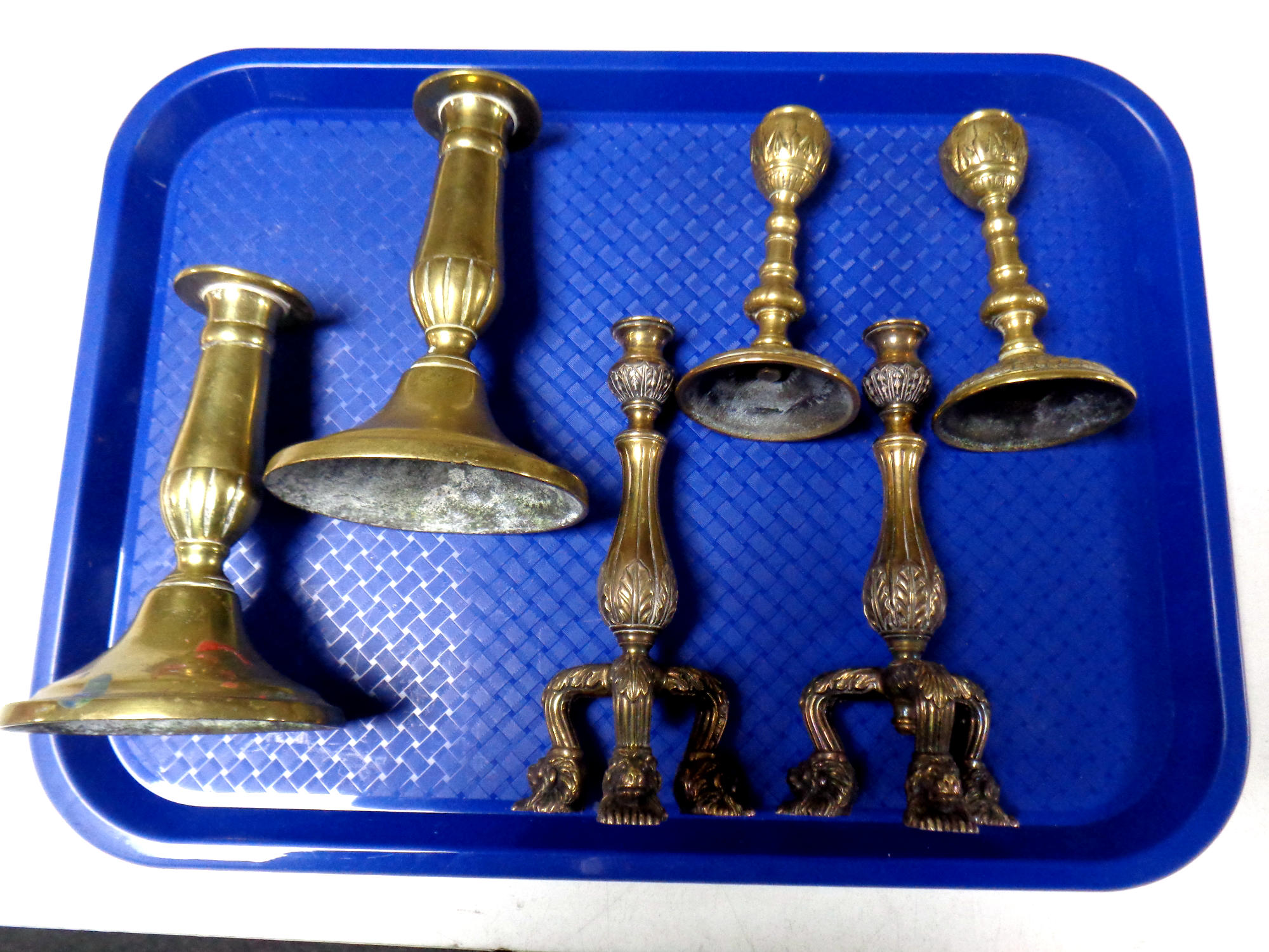 Three pairs of antique brass candlesticks