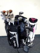 Four golf bags to include Nike, Yonex etc containing irons and drivers,