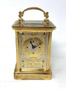 A 20th century Swiss gilt metal cased carriage clock, the movement signed Igor Carl Faberge,