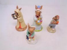 A group of four Royal Doulton Bunnykins figures comprising Mother's Day, Mrs Bunnykins,
