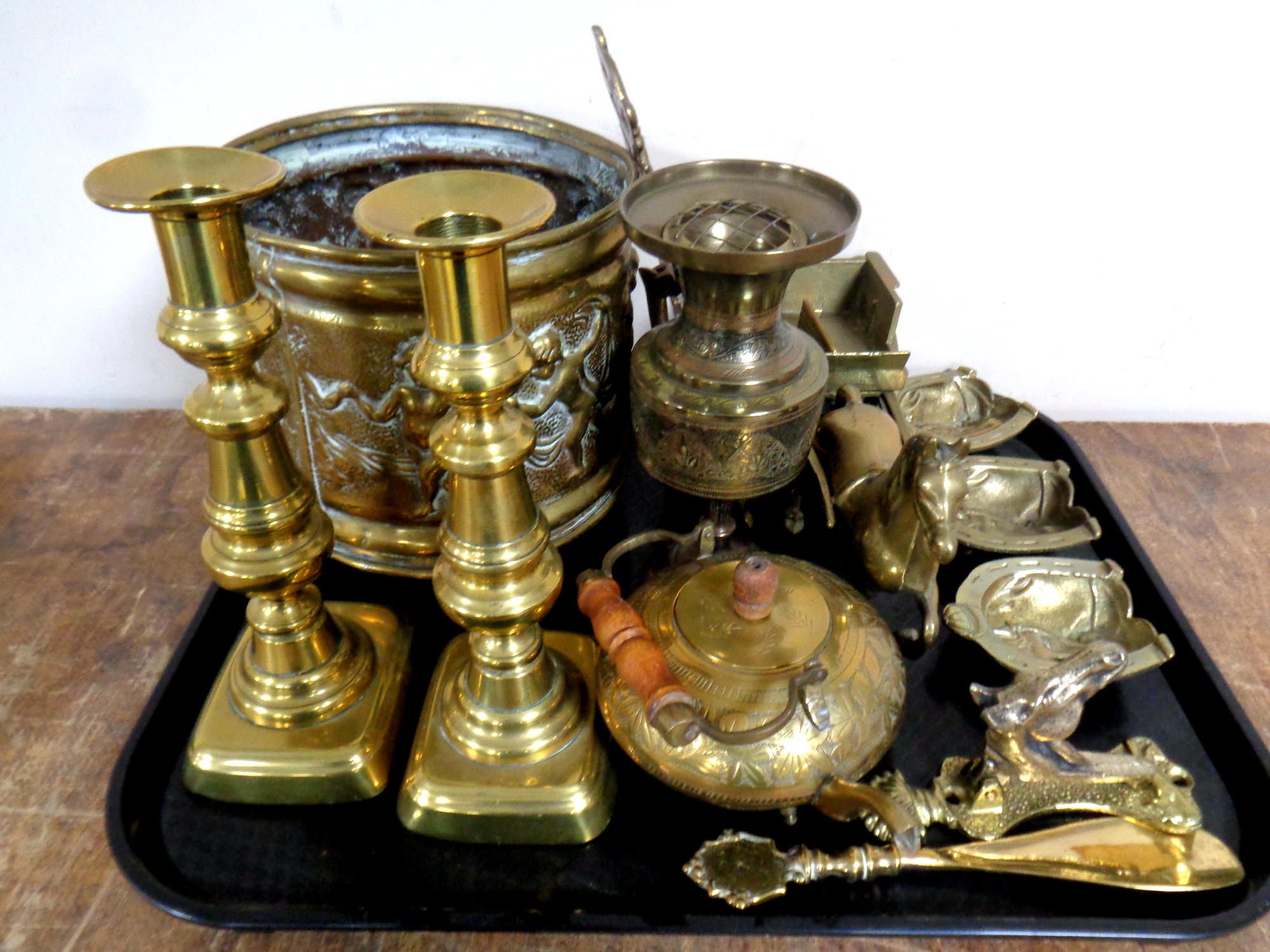 A tray containing antique and later brass ware to include pair of 19th century candlesticks,