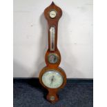 An antique mahogany barometer