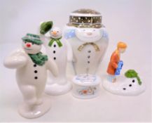 A collection of five pieces of Royal Doulton and Coalport The Snowman figures,