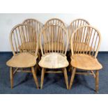 A set of six pine stickback kitchen chairs