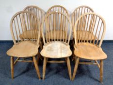 A set of six pine stickback kitchen chairs