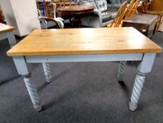 An oak topped kitchen table on painted base, length 120 cm,