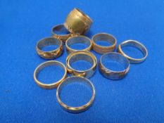 Twelve brass jeweler's band rings