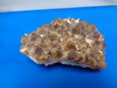 A large topaz rock crystal specimen