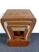 A nest of four oriental style tables together with a wooden stereo box