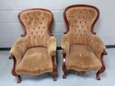 A pair of Victorian mahogany framed armchairs upholstered in a brown button dralon