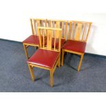 A set of four church chairs