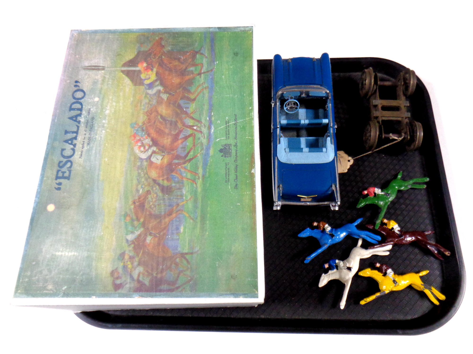 A tray containing a boxed Chad Valley Escalado together with a Danbury Mint die cast car and a set