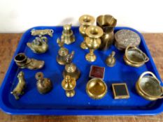 A tray containing assorted brass ware to include a pair of miniature brass censors, brass vases,