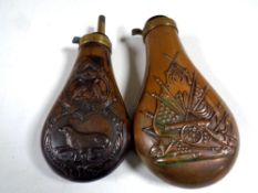 Two copper and brass embossed shot flasks