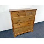 A Edwardian inlaid mahogany two over five drawer chest