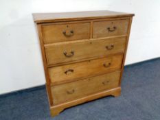 A Edwardian inlaid mahogany two over five drawer chest