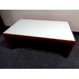 A contemporary Calligaris glass topped coffee table