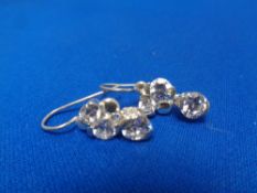 A pair of silver cubic zirconia earrings