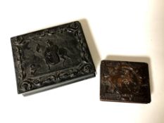 An ornate cast resin daguerreotype case together with one further similar box