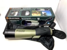 A boxed Celestron Ultima 80 mm spotting scope