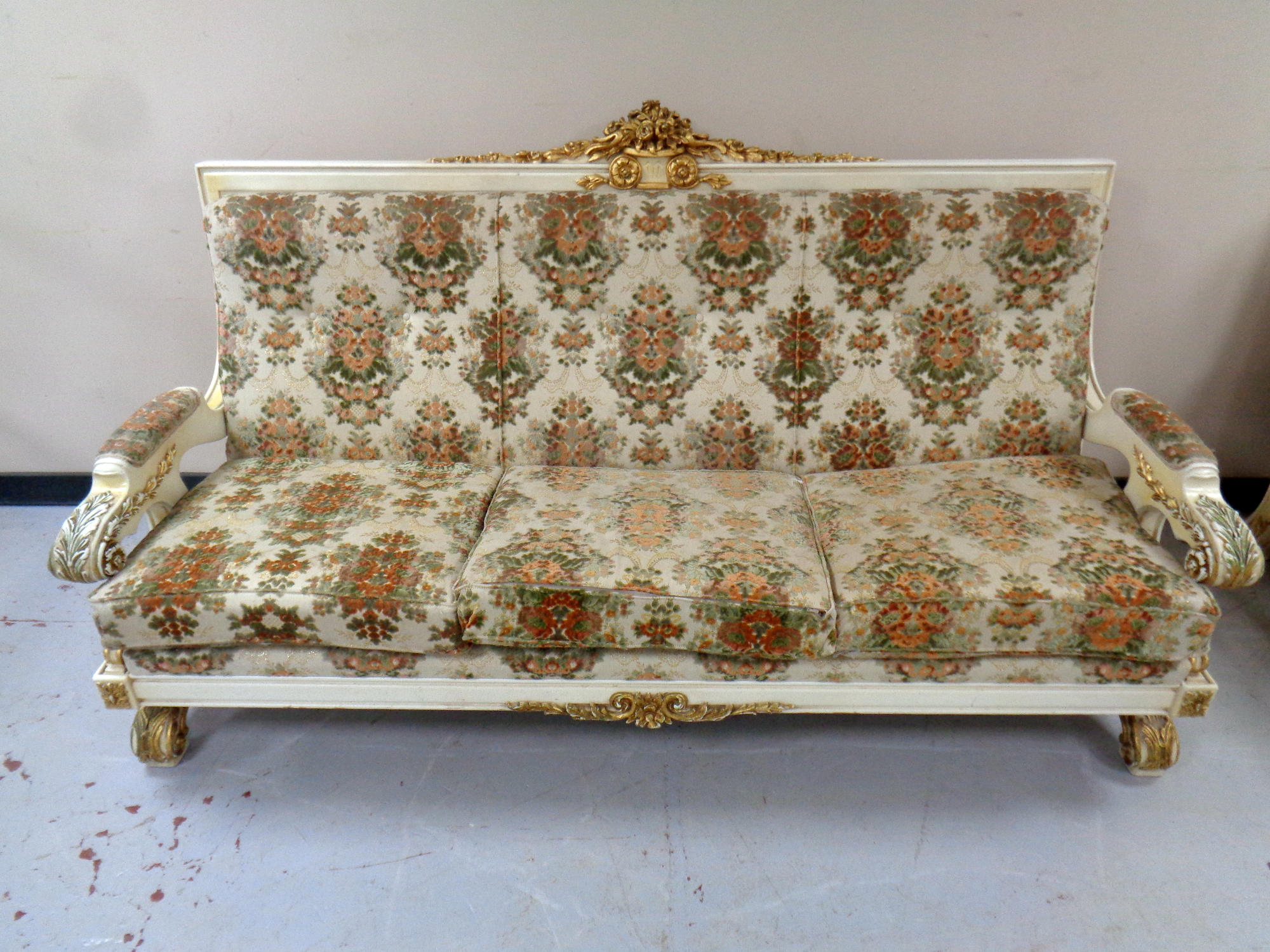 An Italian Silik Baroque style three seater settee,