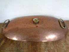 A 19th century copper and brass oval bed warmer,