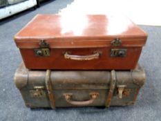 A vintage 20th century leather luggage case together with a bentwood bound trunk