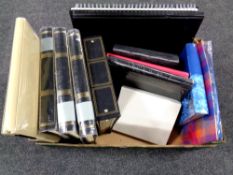 A box containing a quantity of photograph albums