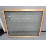 A framed etched pub window W M Stones Ltd,