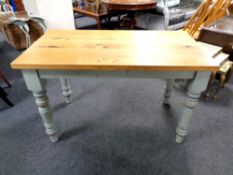 An oak topped kitchen table on painted base, length 120 cm,