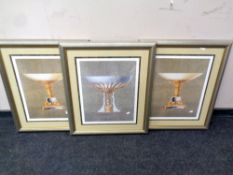 Three contemporary prints depicting comports in decorative silvered frames