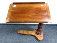 A Victorian mahogany adjustable reading table