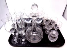A tray containing a set of four glass champagne flutes, set of six wine glasses,