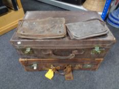 Two vintage leather luggage cases and two tooled leather handbags