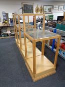 Six square oak shop display stands with glass shelves