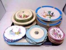A tray containing a quantity of continental porcelain blue and gilt dessert plates,