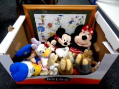 A pine framed Disney picture together with a quantity of Disney and other soft toys