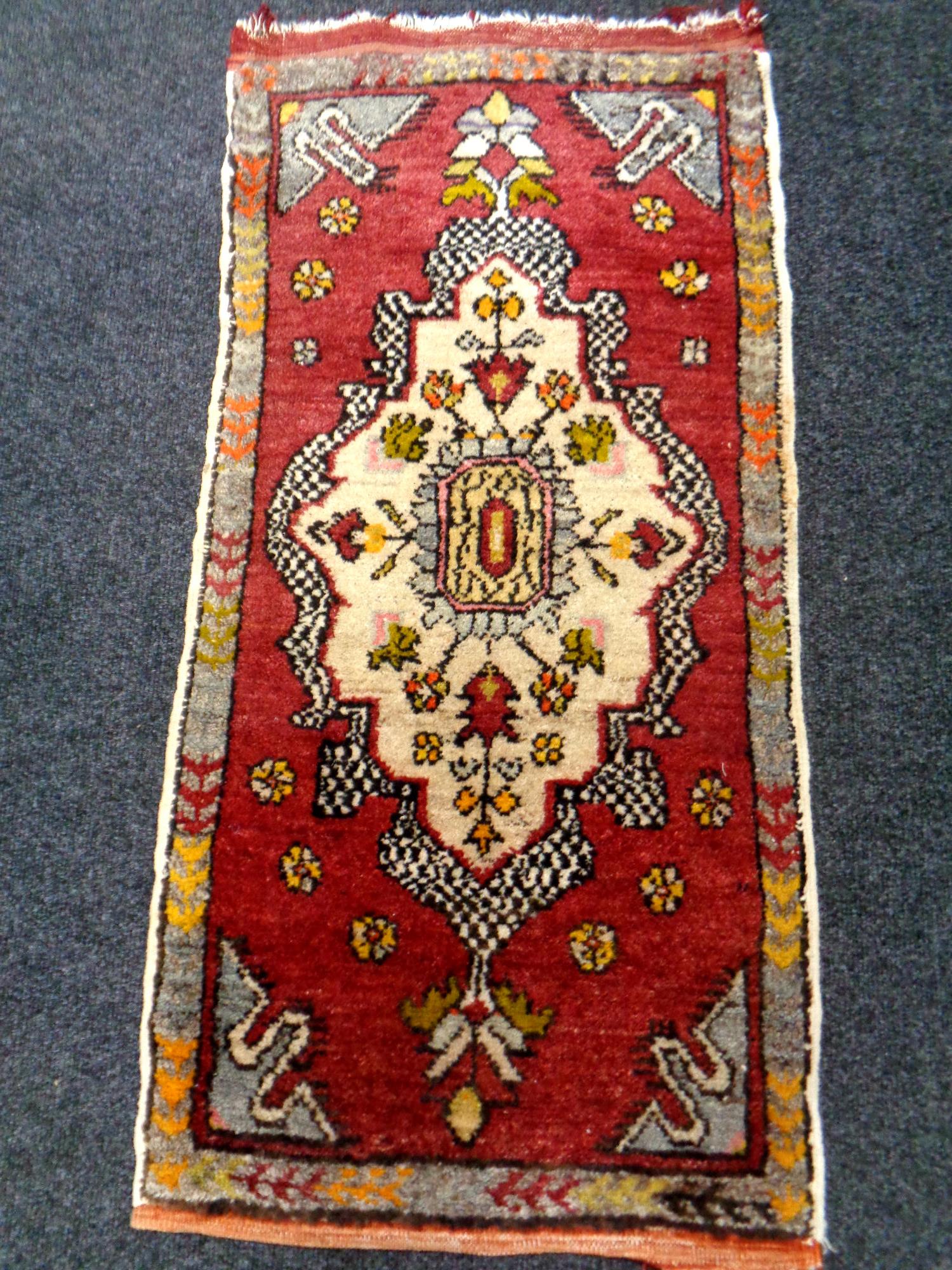 A small Afghan rug,