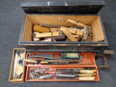 A vintage pine joiner's tool box containing a good selection of joinery tools including planes,